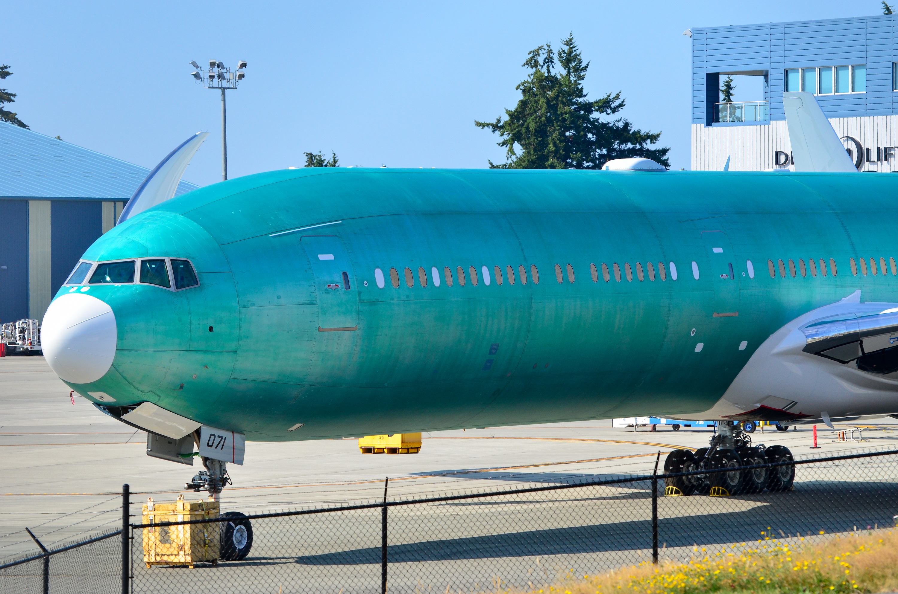 An All Nippon Airways Boeing 777-9 waits in storage at Boeing's twin-aisle assembly site in Everett, Wash.