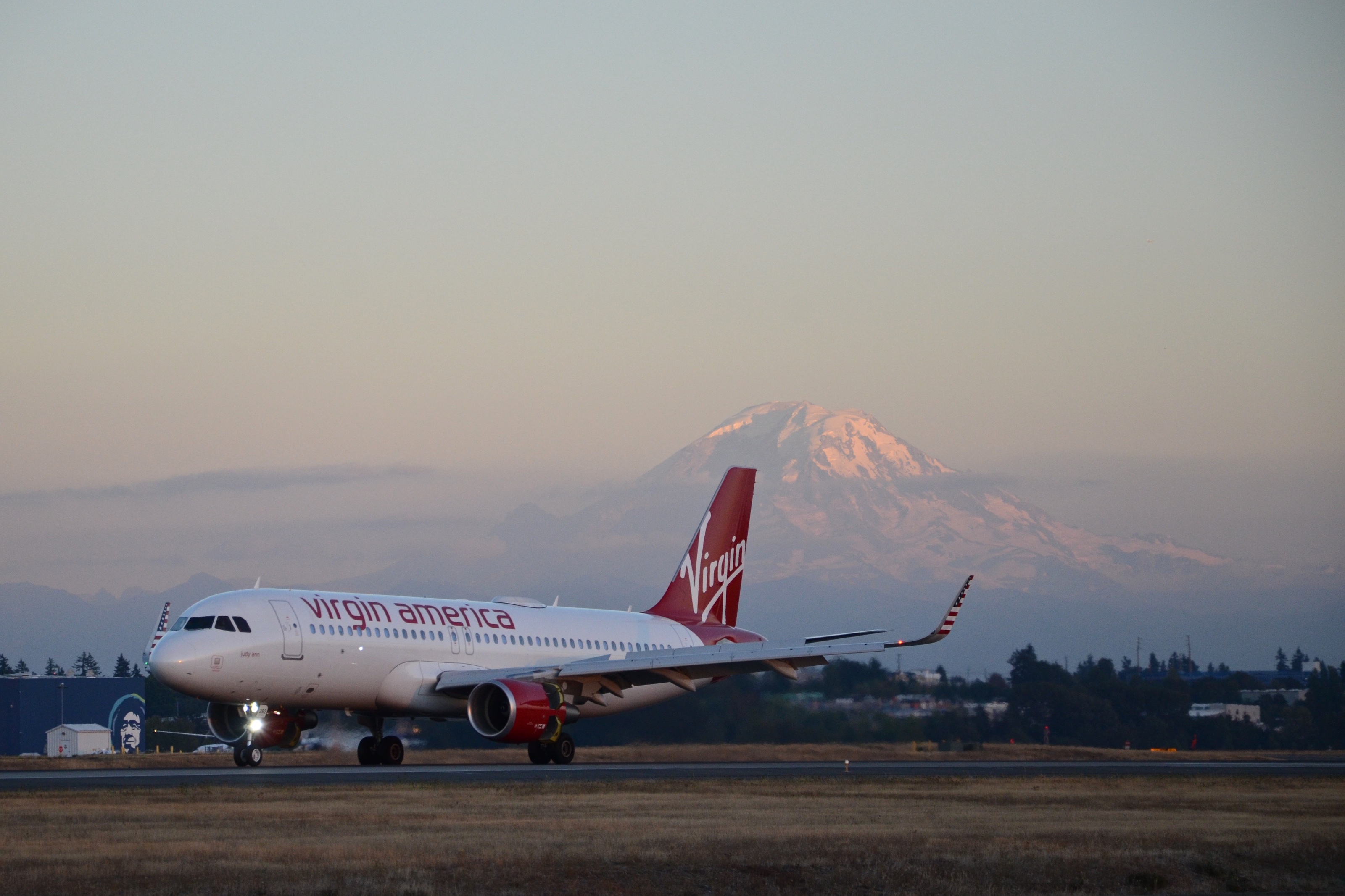 Washington state's Mt. Rainier in the background as a Virgin America Airbus A320 lands at Seattle-Tacoma International Airport in 2016.