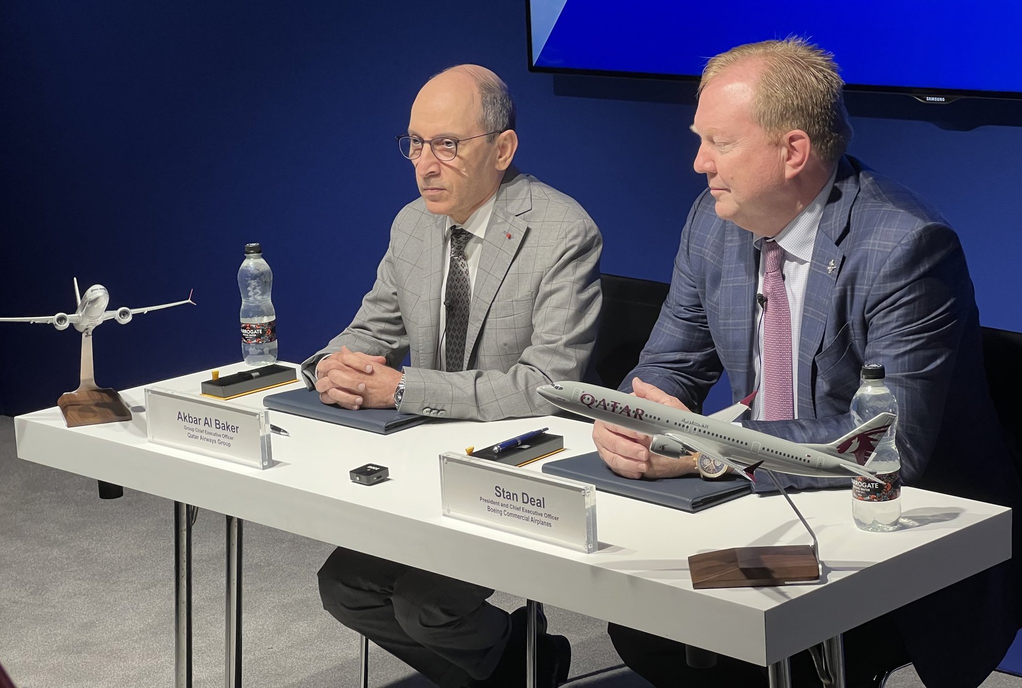 Qatar Airways Akbar Al-Baker and Boeing's Stan Deal announcing an order for 25 737 Max 10 aircraft, born from the airline's dispute with Airbus over peeling paint on its A350 fleet.