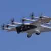 Archer's prototype Midnight aircraft N703AX shown against a blue sky during a 55-mile piloted CTOL flight in Salinas, California in August