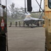 U.S. Air Force Airmen assigned to the 27th Fighter Squadron, 1st Fighter Wing, perform maintenance checks on one of their F-22 Raptors amid joint refueling operations with the U.S. Army in support of Valiant Shield 24 at the Tinian International Airport, Tinian, Northern Mariana Islands, June 11, 2024.