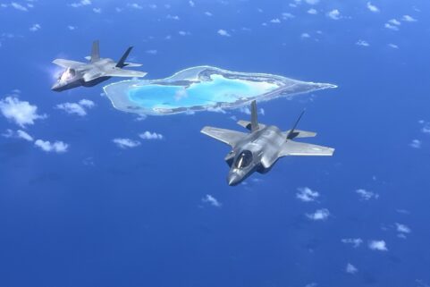 Two F-35B Lightning IIs in flight over Wake Island